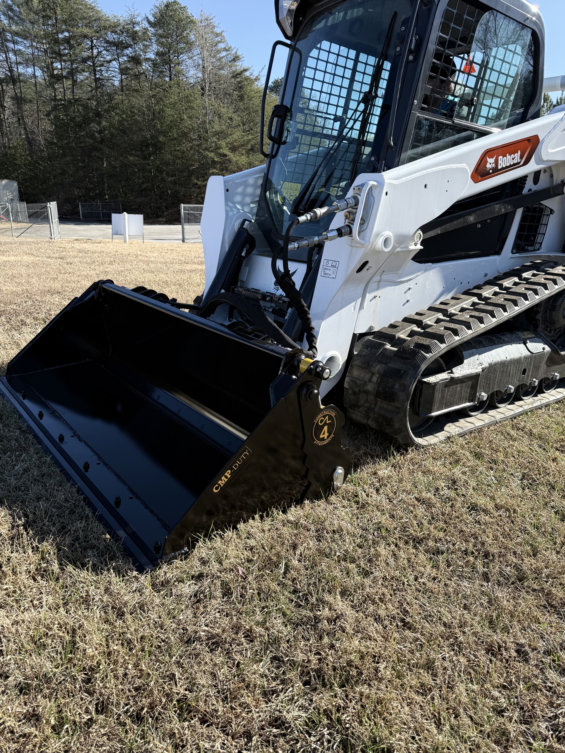 Compact tractor loader 4-in-1 bucket for digging, loading and material handling