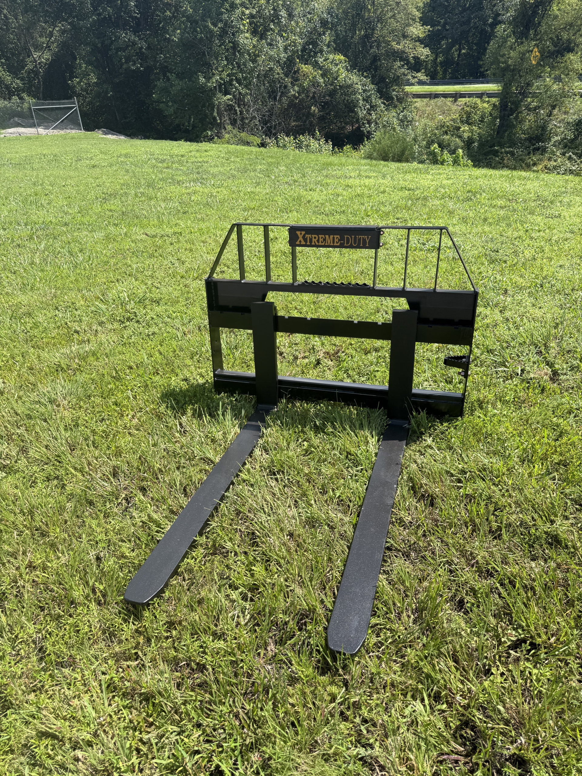 Xtreme Duty skid steer pallet fork attachment with heavy-duty fork tines