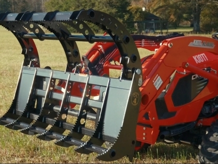 Compact Root Rake Grapple open on Kioti compact tractor loader